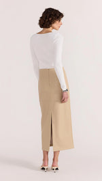 Load image into Gallery viewer, MIRA FAUX LEATHER MIDI SKIRT NATURAL
