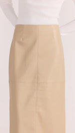 Load image into Gallery viewer, MIRA FAUX LEATHER MIDI SKIRT NATURAL

