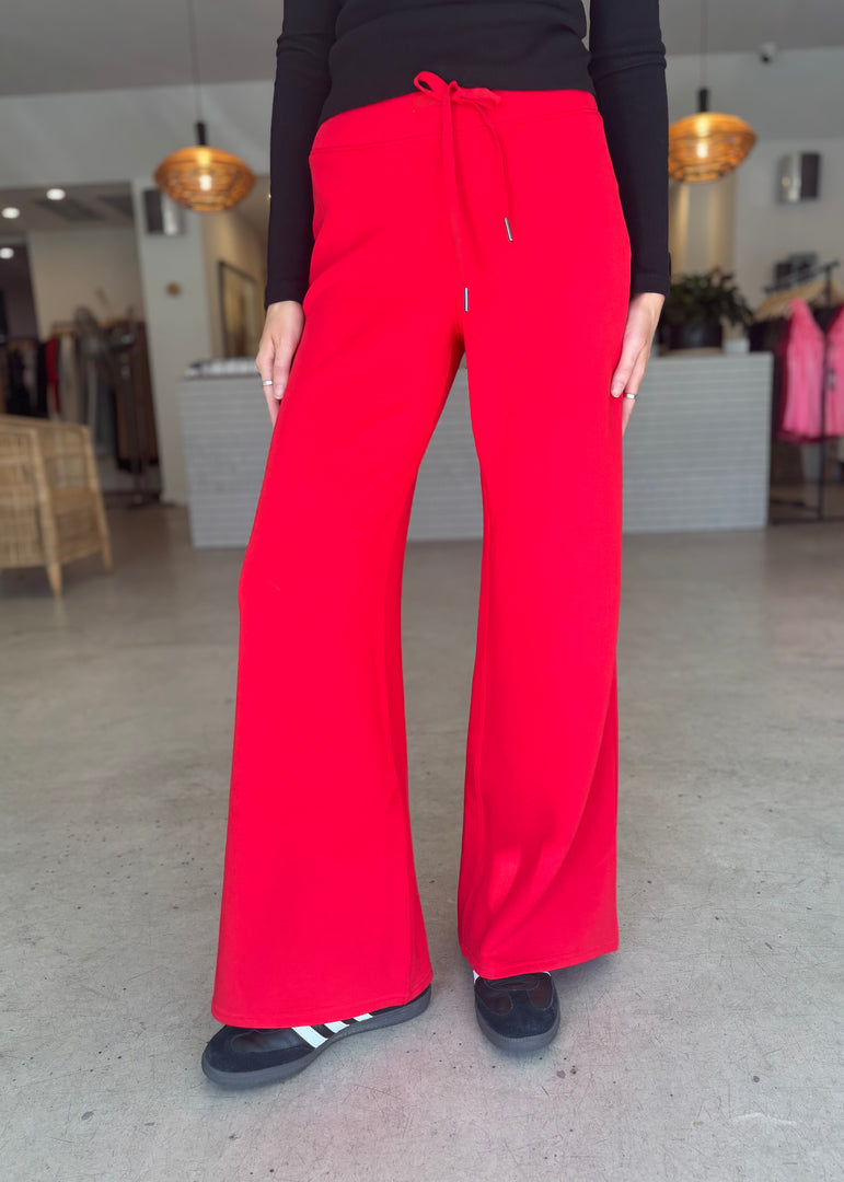 AIR ESS WIDE LEG PANT - RED