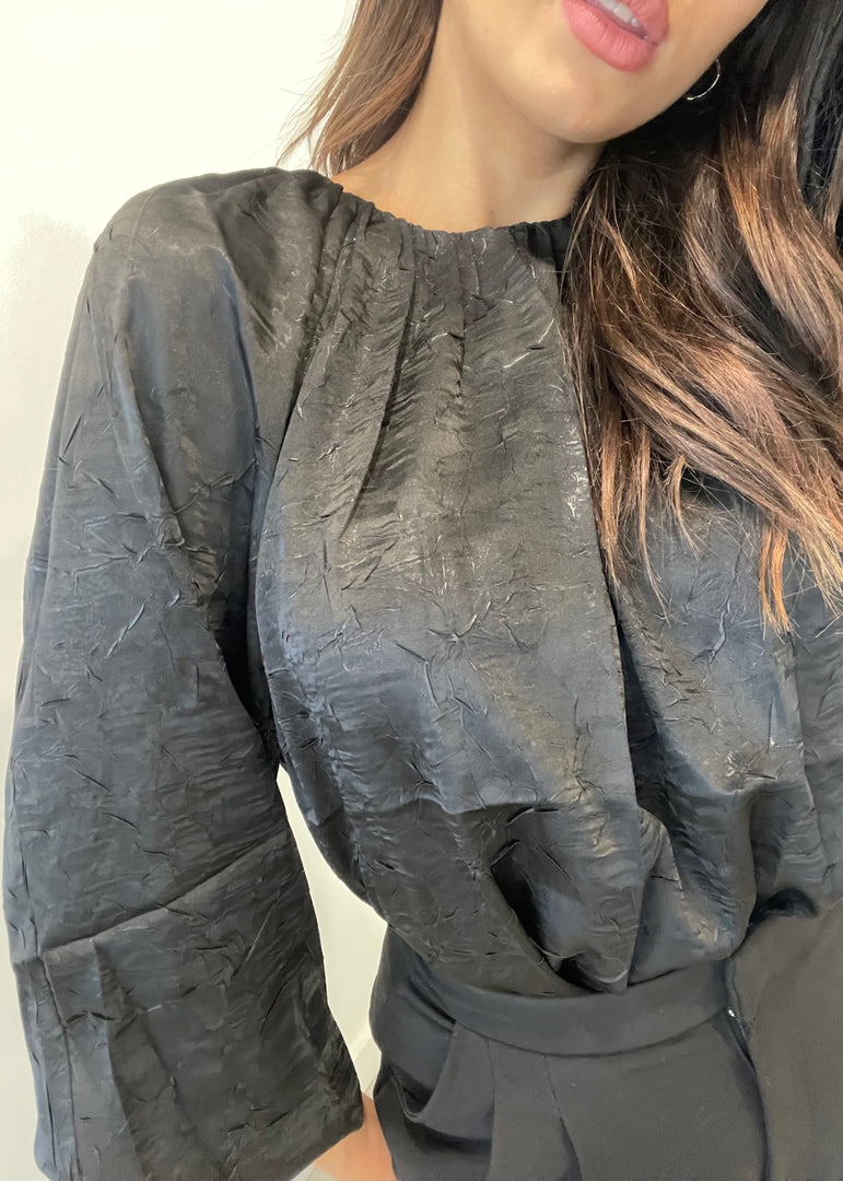 IN MOTION TOP